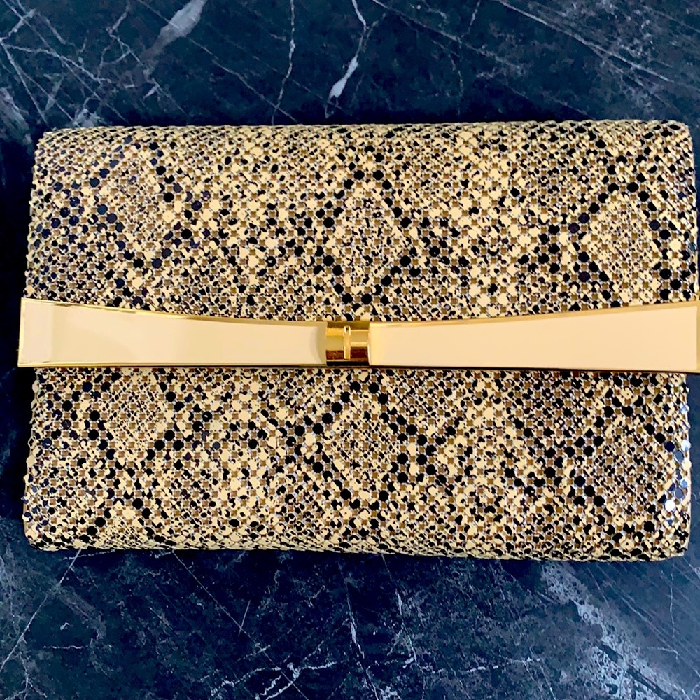 Mesh clutch bag with strap in snakeskin print